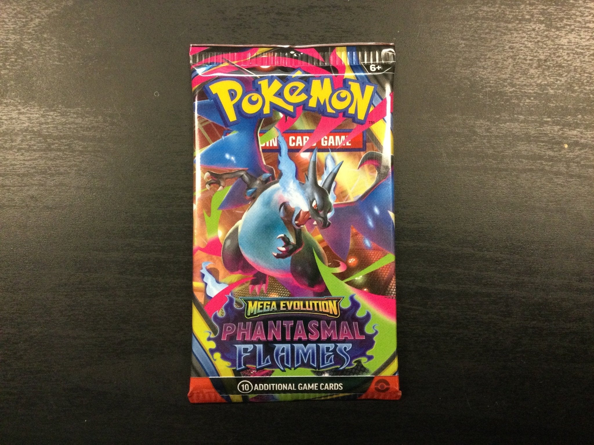 Pokémon Phantasmal Flames booster pack - WiredVillage Games - The Pokémon Company