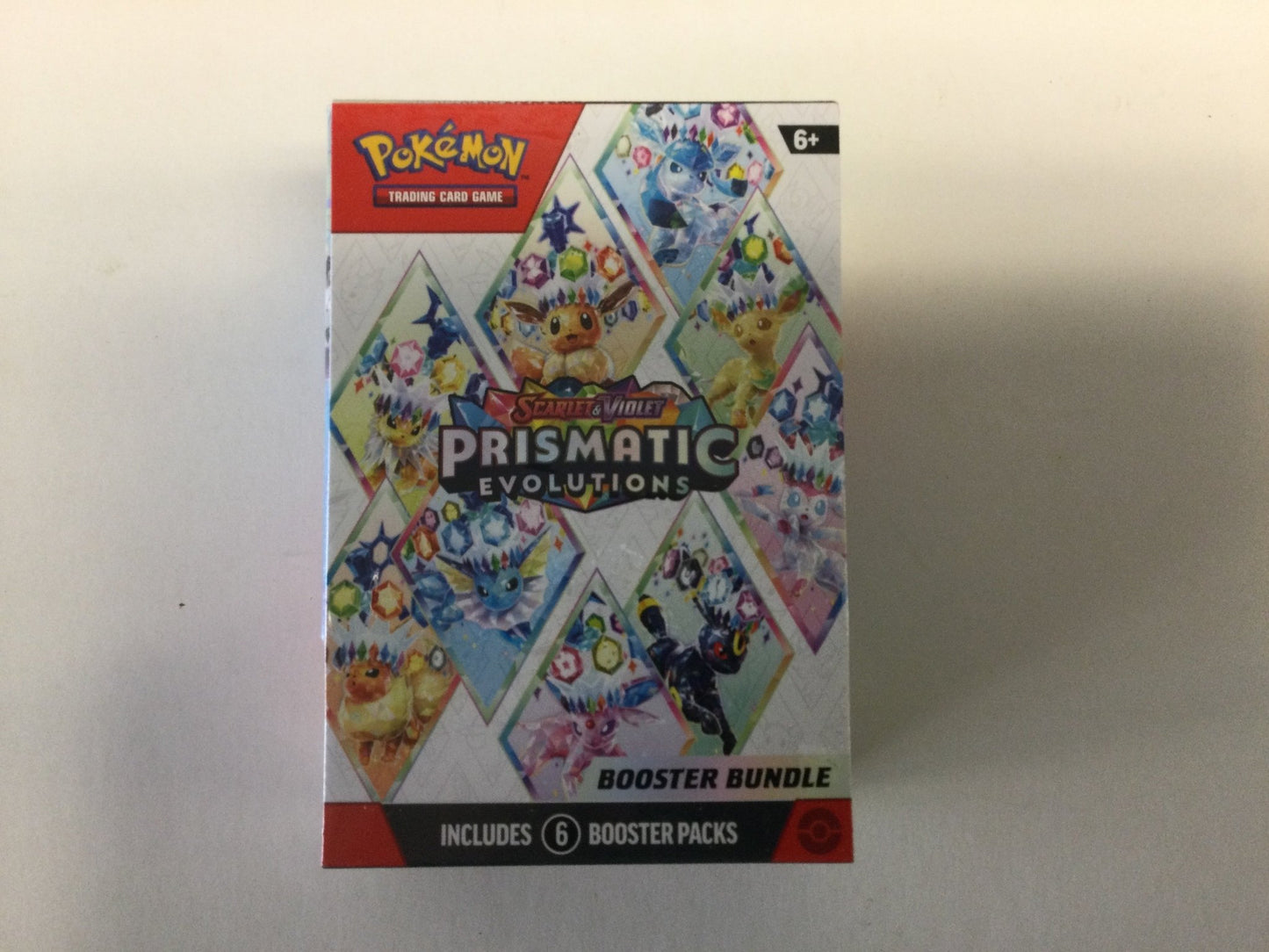 Pokémon Prismatic Evolutions Booster Bundle - WiredVillage Games - The Pokémon Company